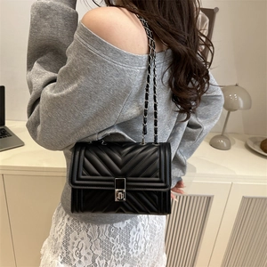 Classic black V-quilted faux leather crossbody bag with chain strap and silver lock