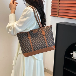 Large vintage printed tote bag in brown faux leather with elegant chain pattern