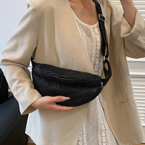 Chic black sequin waist bag for women featuring adjustable strap and silver zipper detail