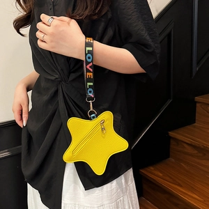 Bright yellow star-shaped mini handbag with rainbow LOVE embroidery strap and zipper