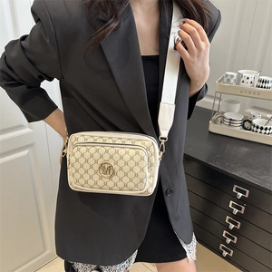 Retro monogram crossbody camera bag with wide strap and golden M buckle for women