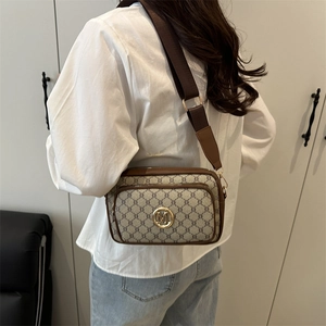 Retro brown crossbody camera bag with geometric print and wide shoulder strap