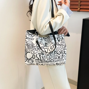 Sac fourre-tout blanc tendance avec imprimés graffiti cartoon et anses en cuir