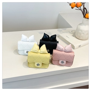 Quilted mini crossbody bags featuring ribbon bows and rose-shaped metallic clasps