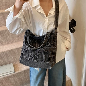 Black washed denim large capacity crossbody bag with YOUTH embroidery and frayed edges