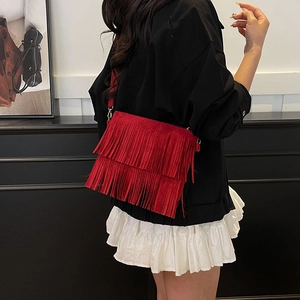 Vintage red fringe crossbody bag with suede texture and boho tassels for women