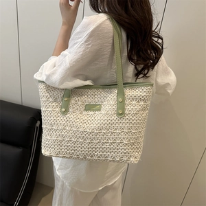 French retro woven tote bag in cream white hollow pattern with green leather handles