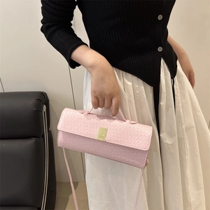 Pink woven rectangular crossbody bag with golden buckle and slim strap for women