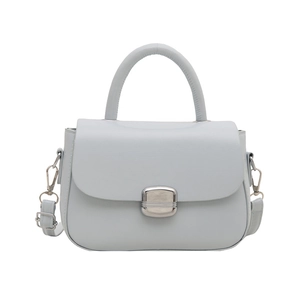 Minimalist light blue handbag with cylindrical top handle and silver buckle detail