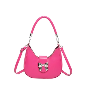 Fuchsia pink hobo shoulder bag with silver bow buckle and adjustable strap