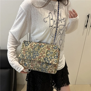 Vintage floral tapestry chain shoulder bag featuring blue and red print and woven strap