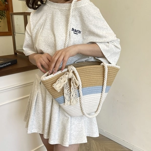 Three-color striped woven tote bag with lace bow and rope handles for beach vacation