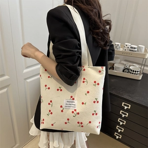 Chic cream corduroy tote bag with red cherry print and large capacity for women