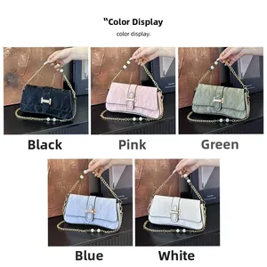 Detailed display of vintage pleated shoulder bags in five colors with beaded chain straps