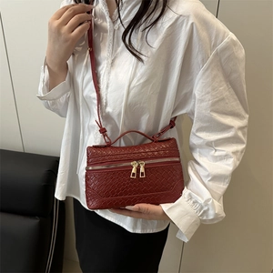 Red woven leather crossbody bag for women with gold double zippers and thin strap