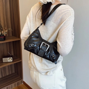 Vintage black underarm shoulder bag with silver buckle and moto-style aesthetic