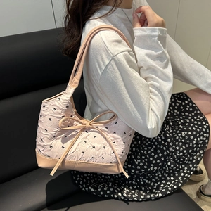 Pink bow-knot handbag with pleated texture and black butterfly prints for summer fashion