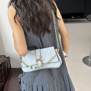 Light blue pleated shoulder bag with gold H-buckle and beaded metal chain strap