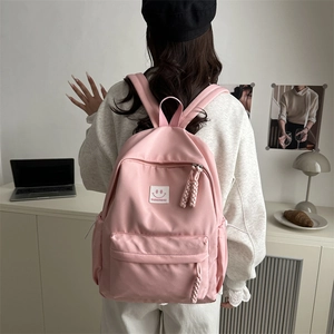 Pink minimalist aesthetic backpack with fashion label and large capacity for students