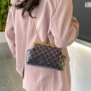 Crossbody chain bag with holographic fish scale sequins and metallic clasp closure
