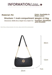 Detailed view of black PU shoulder bag with letter M print and gold metal logo charm