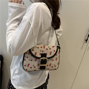 Chic cream shoulder bag with red cherry print and black trim for 2025 summer