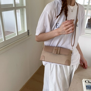 Chic beige woven crossbody bag with leather trim and gold hardware for women