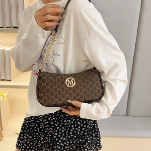 Chic coffee crescent underarm bag with M letter print and gold chain shoulder strap