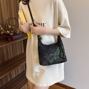 New Chinese-style crossbody bag with vibrant green leaf prints and drawstring closure