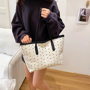 Grand sac cabas blanc à motif nœuds avec lanières en cuir noir pour femme chic