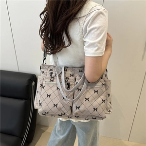 Fashionable corduroy tote bag with black bow print and large capacity pockets