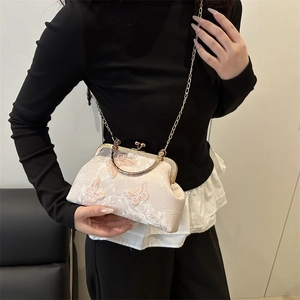 Elegant light pink shell bag with 3D butterfly embroidery and golden chain strap