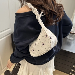 White ruched shoulder bag featuring colorful polka dots and cute bear patterns
