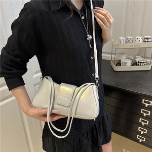 Minimalist silver pearl texture shoulder bag with flap closure and multi-strap design