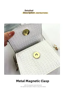 Dettaglio della borsa bianca motivo coccodrillo con chiusura magnetica in metallo dorato