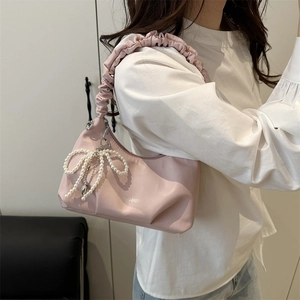 Pink soft faux leather cloud handle handbag with elegant pearl bow charm for women