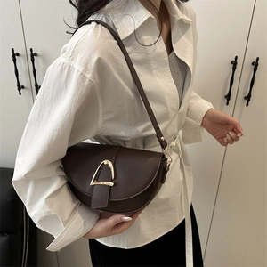 Retro coffee brown half-moon saddle bag with large gold horseshoe buckle for women