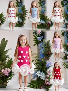 Detail view of colorful sleeveless girls dresses featuring 3D heart and floral mesh tulle