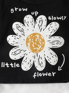 T-shirt noir en coton pour fille avec imprimé marguerite et slogan artistique