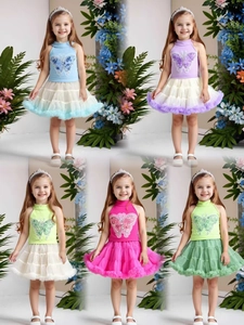 Detail of girls summer sequin butterfly top and layered tutu skirt in five colors