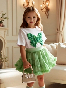 Girl's white short sleeve T-shirt with 3D butterfly applique and green tiered tutu skirt