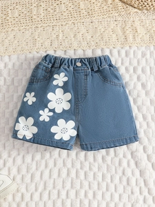 Vintage Kinder-Jeansshorts in Blau mit Gänseblümchen-Druck und bequemem Elastikbund