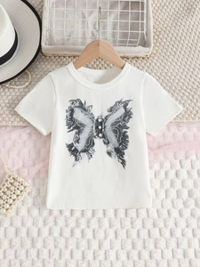 Girls white short sleeve t-shirt with beaded butterfly print on textured background