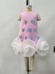 Pink sleeveless girls dress featuring blue 3D hearts and large white organza flowers