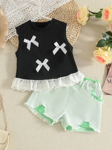 Girls' black bow tank top with lace trim and distressed green denim shorts outfit set