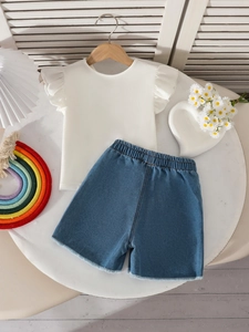 Girls summer two-piece outfit with white ruffled sleeve t-shirt and denim shorts