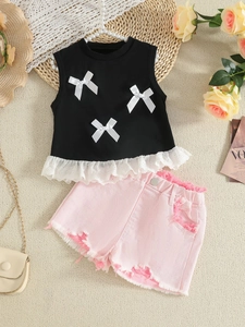 Girls summer set featuring black bow tank top with lace and pink denim shorts