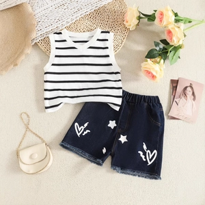 Detail shot of girls striped tank top and star heart print denim shorts set