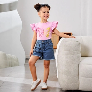 Detail of pink ruffled sleeve t-shirt with butterfly print and denim shorts set