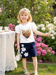 Girls summer set with heart print t-shirt and denim shorts featuring flower detail